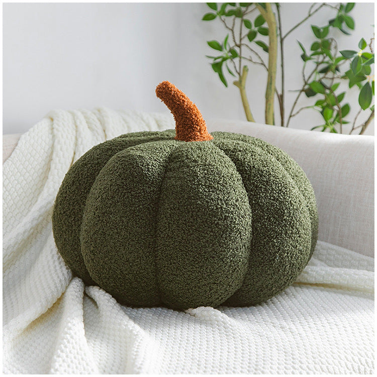 Bright yellow pumpkin cushion enhancing festive vibes